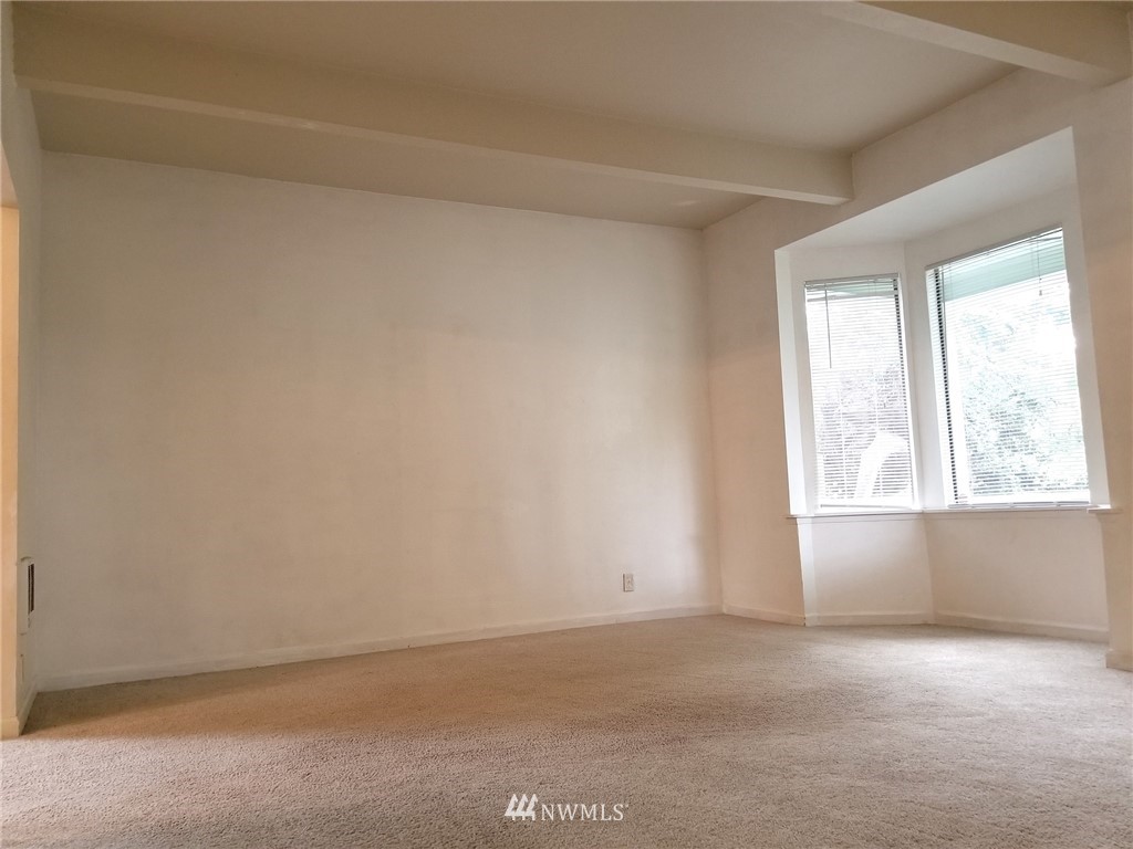 2321 Rucker Avenue Everett, WA 98201 - Photo 3 of 12 an empty room with a window