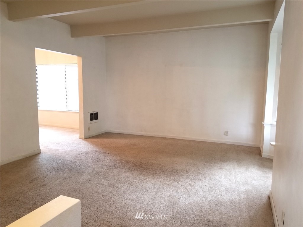 2321 Rucker Avenue Everett, WA 98201 - Photo 4 of 12 a view of an empty room and window