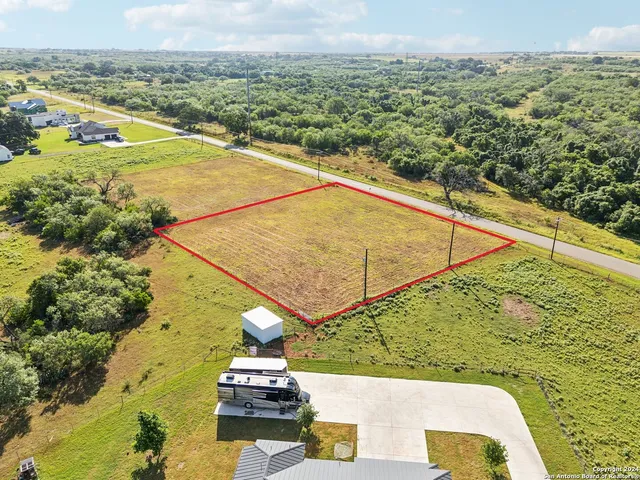 a view of a pool with a lake