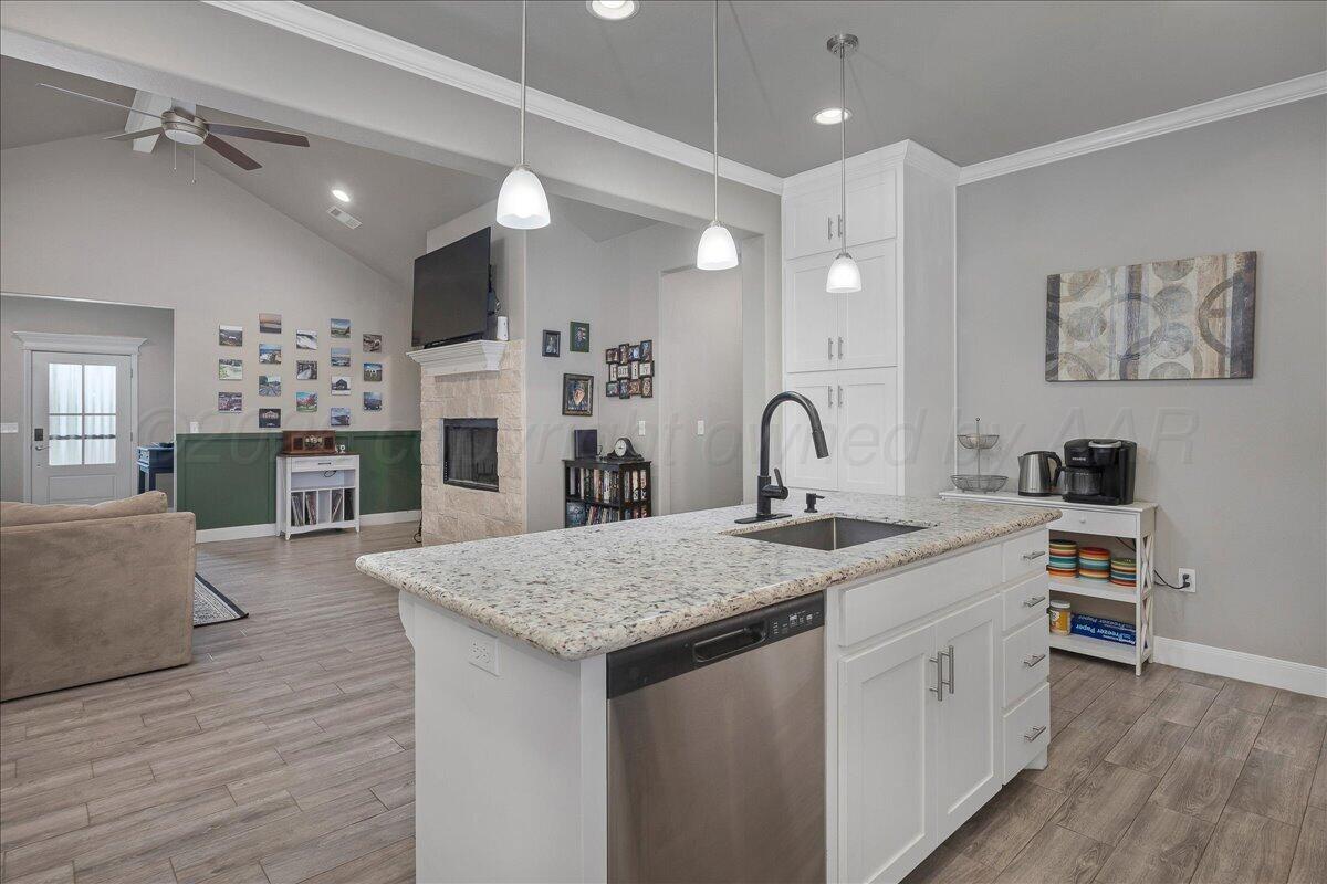 39 Cm Lane Canyon, TX 79015 - Photo 9 of 26 a kitchen with a wooden floor and breakfast area