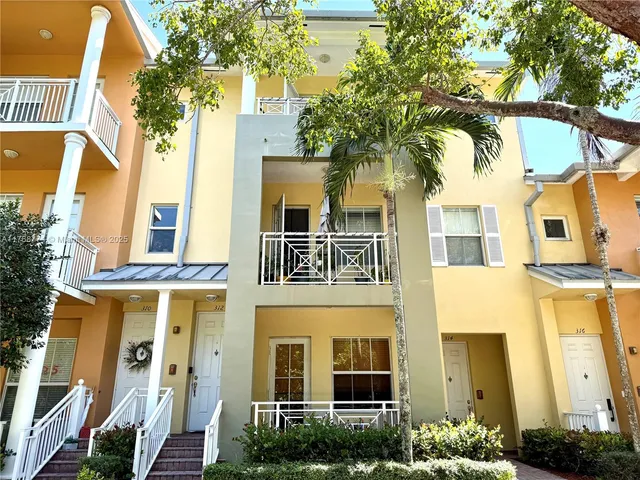 a front view of a multi story residential apartment building