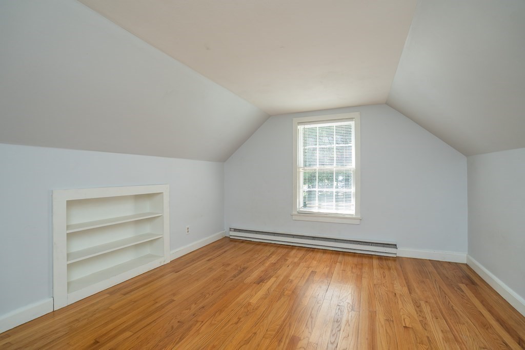 152 Feeding Hills Road Southwick, MA 01077 - Photo 20 of 35 wooden floor in an empty room with a window