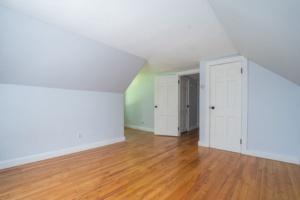 152 Feeding Hills Road Southwick, MA 01077 - Photo 22 of 35 a view of an empty room with wooden floor
