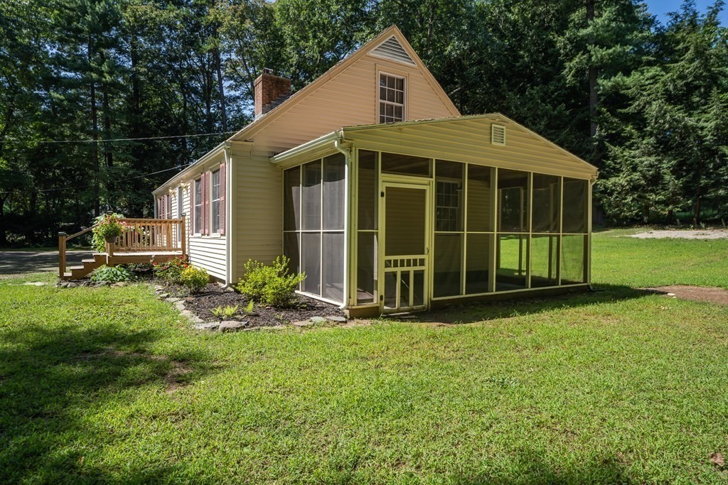 152 Feeding Hills Road Southwick, MA 01077 - Photo 26 of 35 a view of a house with backyard and garden