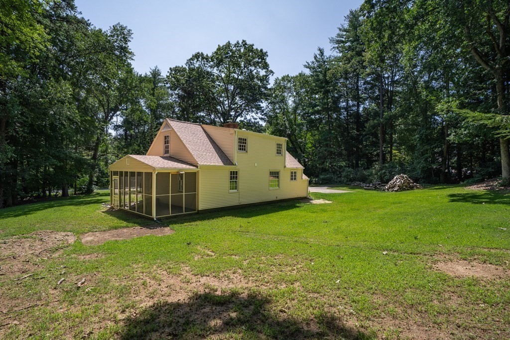 152 Feeding Hills Road Southwick, MA 01077 - Photo 28 of 35 a view of a house with backyard and garden