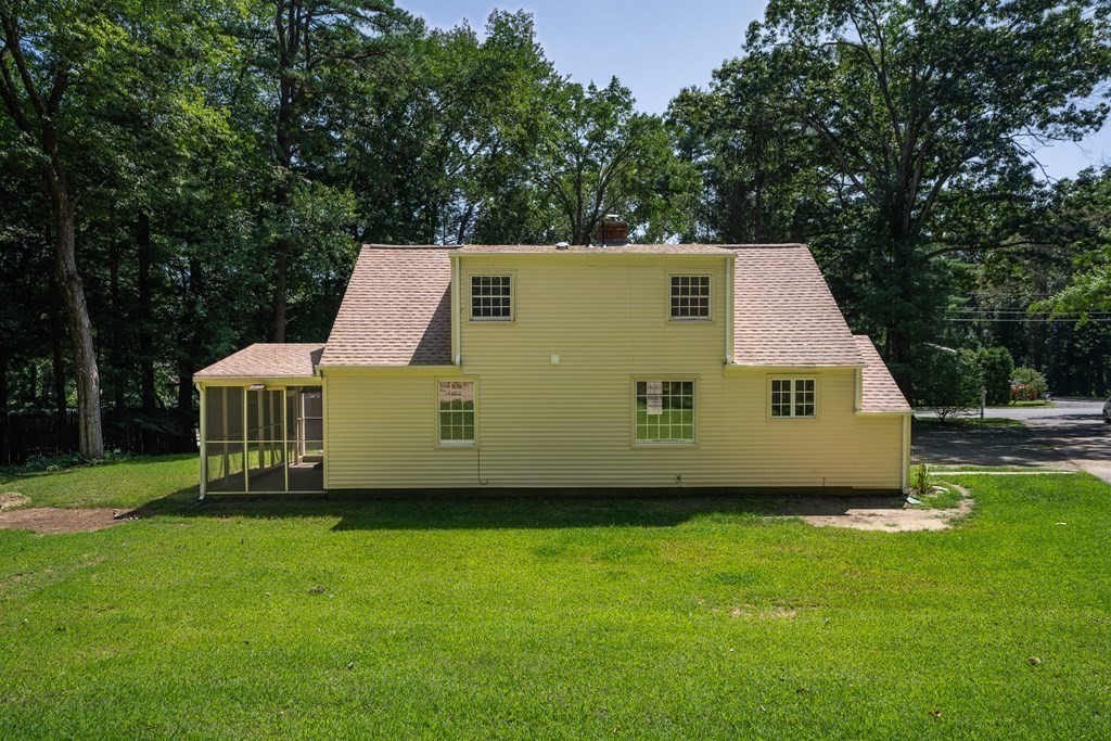 152 Feeding Hills Road Southwick, MA 01077 - Photo 29 of 35 a aerial view of a house with a yard and large trees