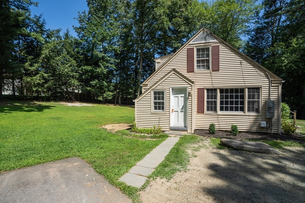 152 Feeding Hills Road Southwick, MA 01077 - Photo 33 of 35 a front view of a house with a yard