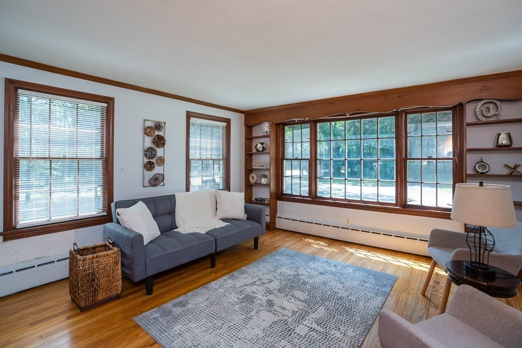 152 Feeding Hills Road Southwick, MA 01077 - Photo 10 of 35 a living room with furniture and a large window