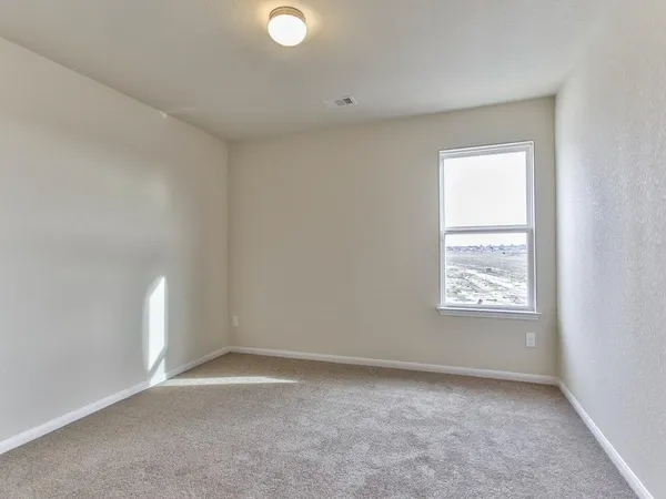 a view of empty room with window
