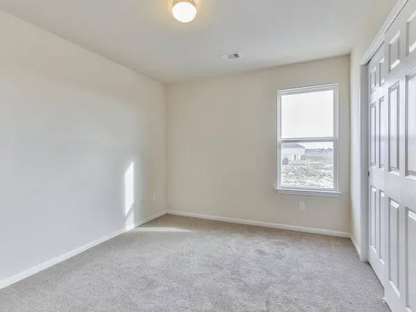 an empty room with windows