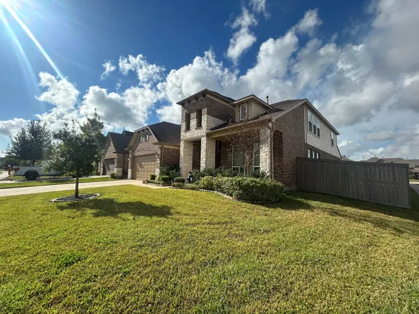 a view of a house with a big yard