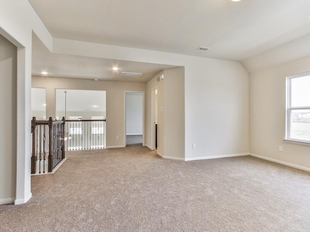 4615 Russet Leaf Trace Katy, TX 77449 - Photo 21 of 32 a view of an empty room with a window