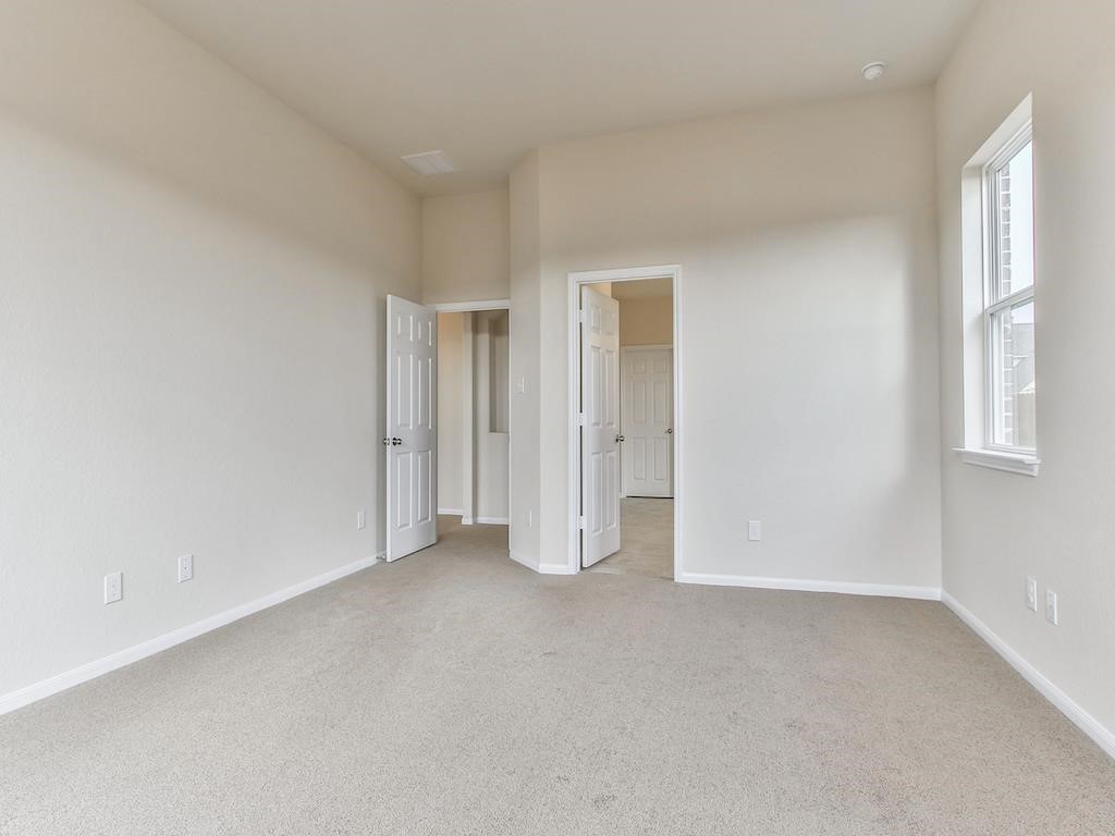 4615 Russet Leaf Trace Katy, TX 77449 - Photo 24 of 32 an empty room with windows