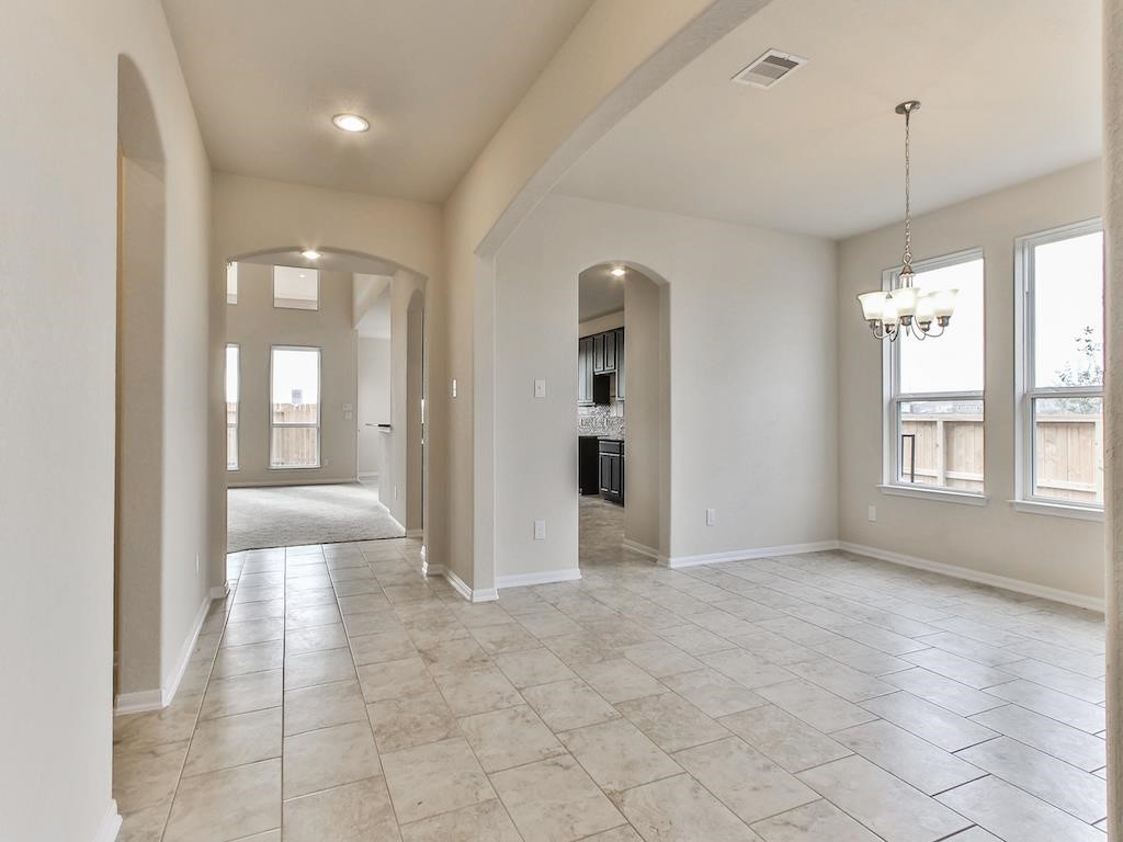 4615 Russet Leaf Trace Katy, TX 77449 - Photo 26 of 32 a view of an empty room with glass door