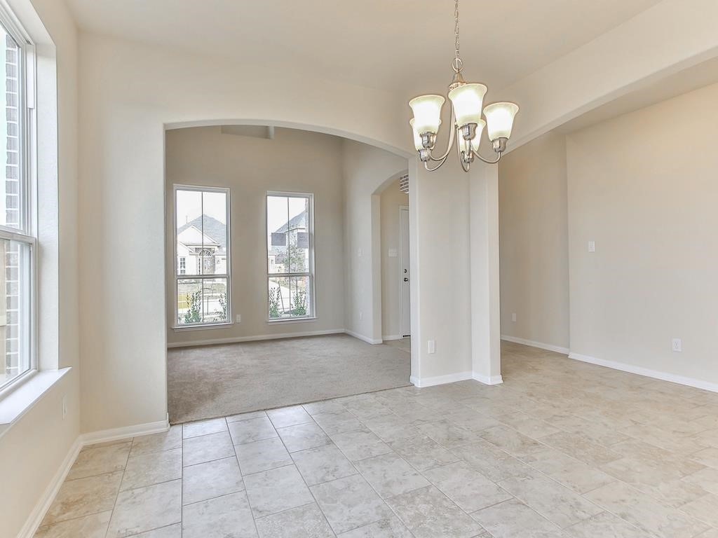 4615 Russet Leaf Trace Katy, TX 77449 - Photo 29 of 32 a view of an empty room with a window
