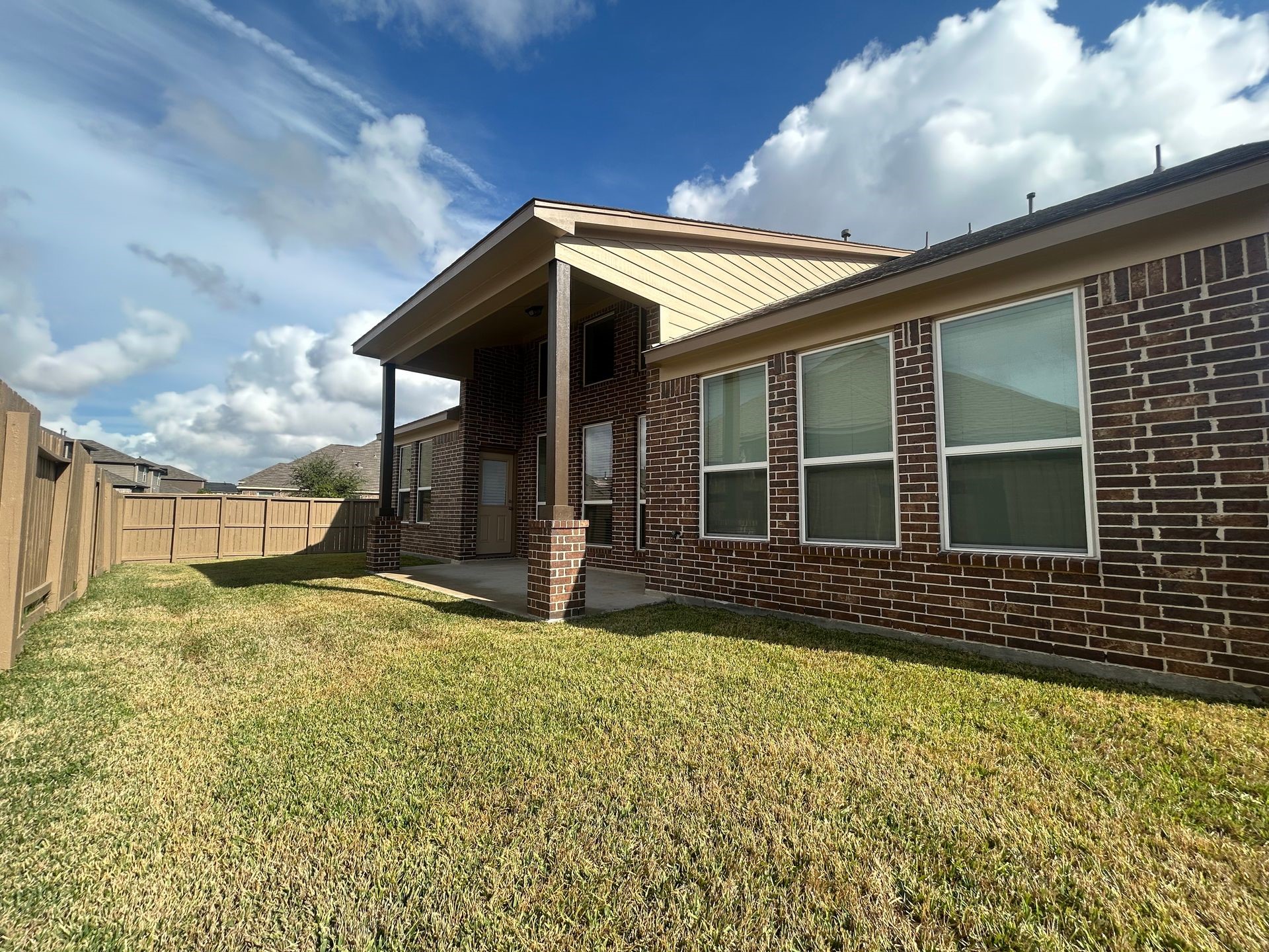 4615 Russet Leaf Trace Katy, TX 77449 - Photo 32 of 32 a view of house with backyard and balcony