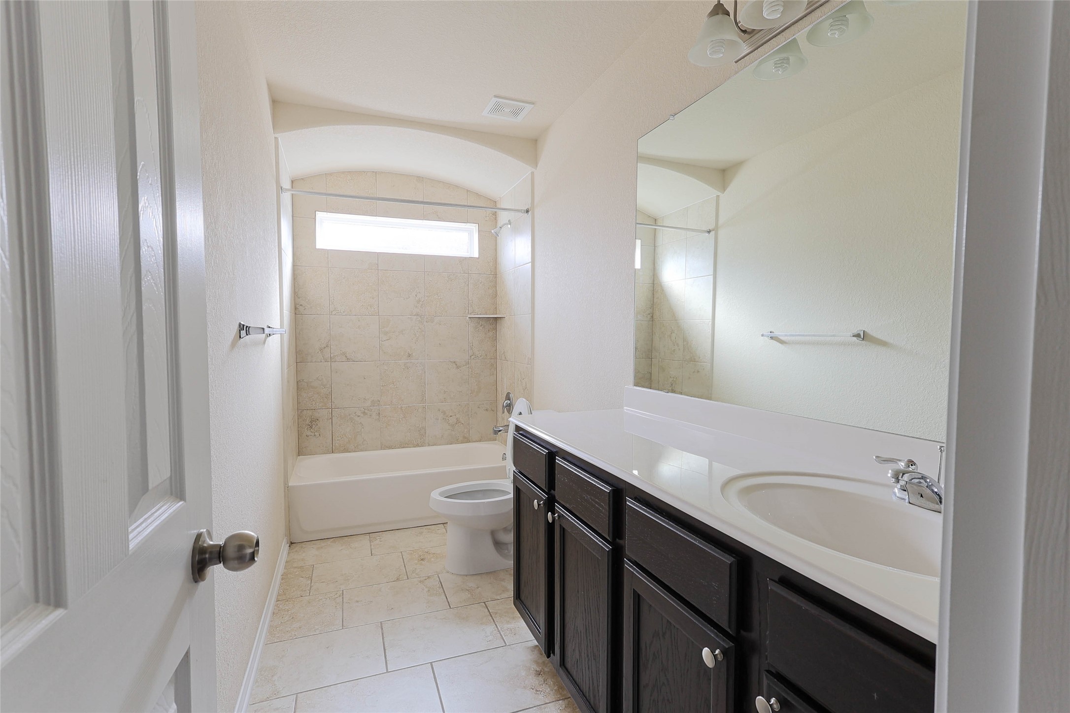 4615 Russet Leaf Trace Katy, TX 77449 - Photo 8 of 32 a bathroom with a sink a toilet and shower