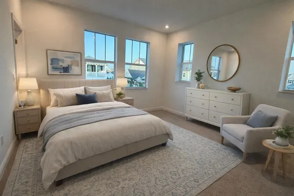 a bed room with a bed mirror and window