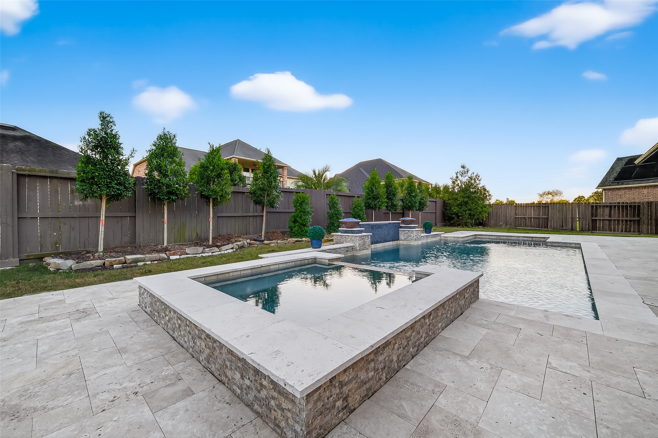 5815 Mustang Ridge Lane Fulshear, TX 77441 - Photo 45 of 50 a view of a swimming pool with a patio