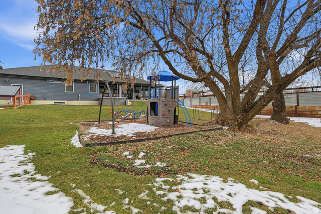 175 North 100 West Providence, UT 84332 - Photo 35 of 45 Snow covered house with a playground