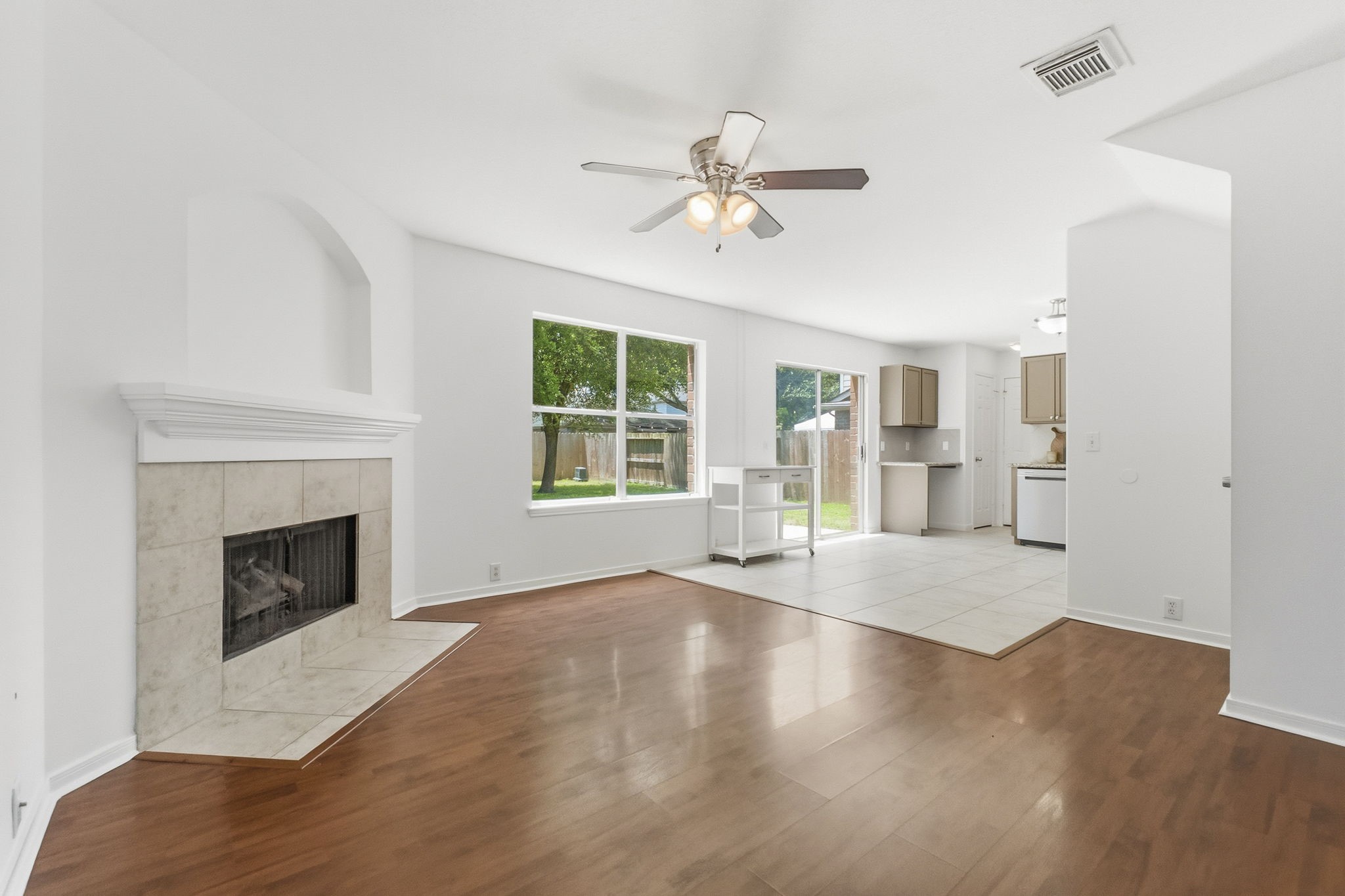 11907 Ezekiel Road Tomball, TX 77375 - Photo 8 of 39 a view of empty room with wooden floor and fan