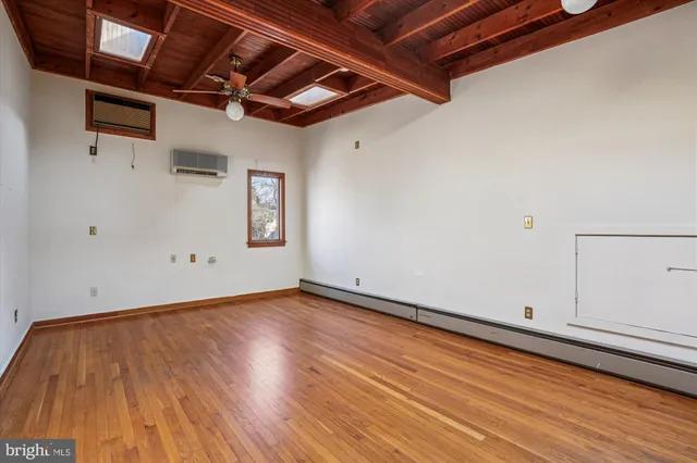 a view of a wooden deck with a bench