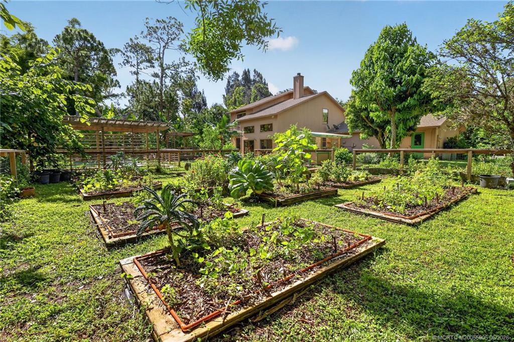 11145 Southwest Meadowlark Circle Stuart, FL 34997 - Photo 52 of 107 Gardener's paradise