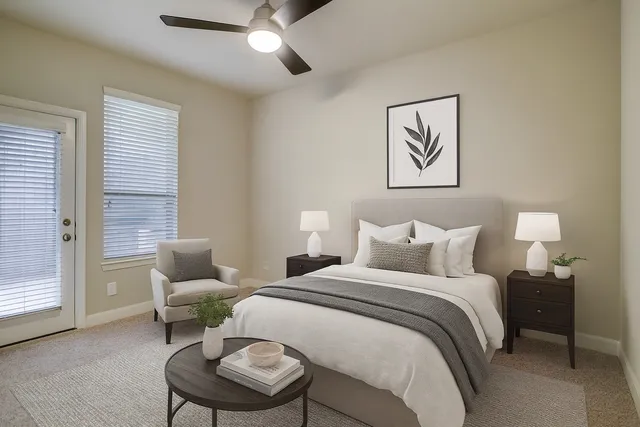 a bathroom with a sink vanity granite toilet and a mirror