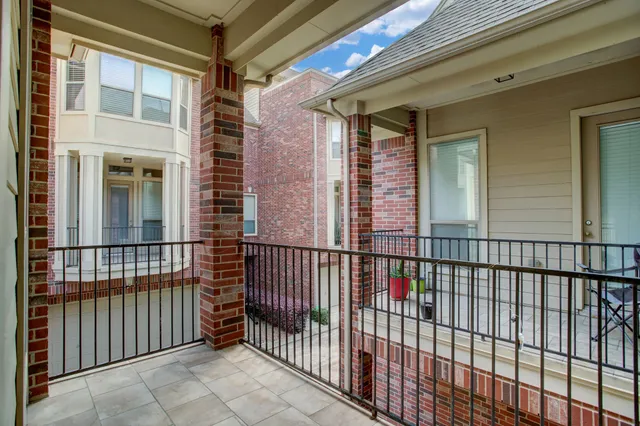 a view of storage and utility room with washer and dryer
