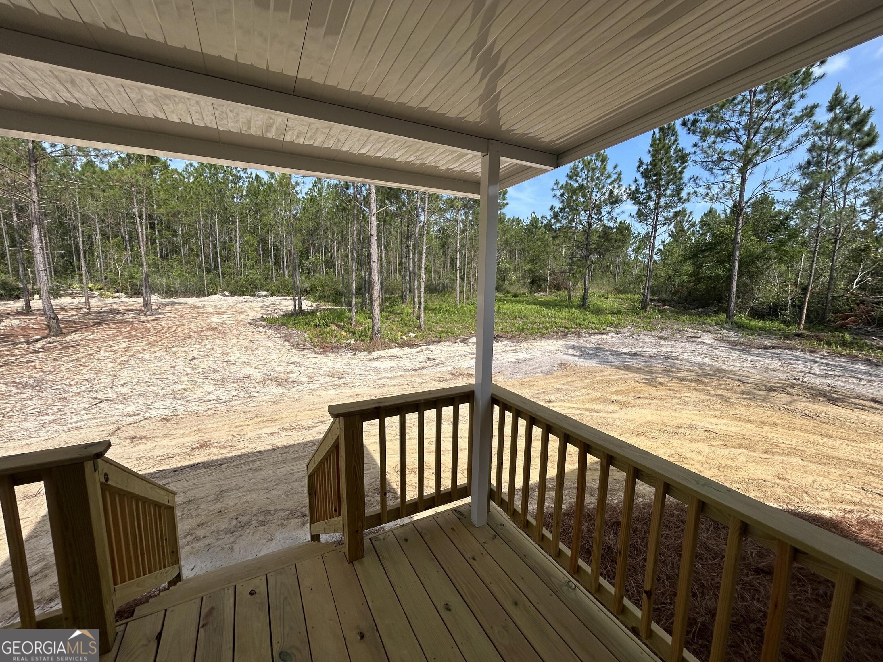 640 Elmer Thrift Road Waycross, GA 31503 - Photo 7 of 23 a view of deck with wooden floor and outdoor space