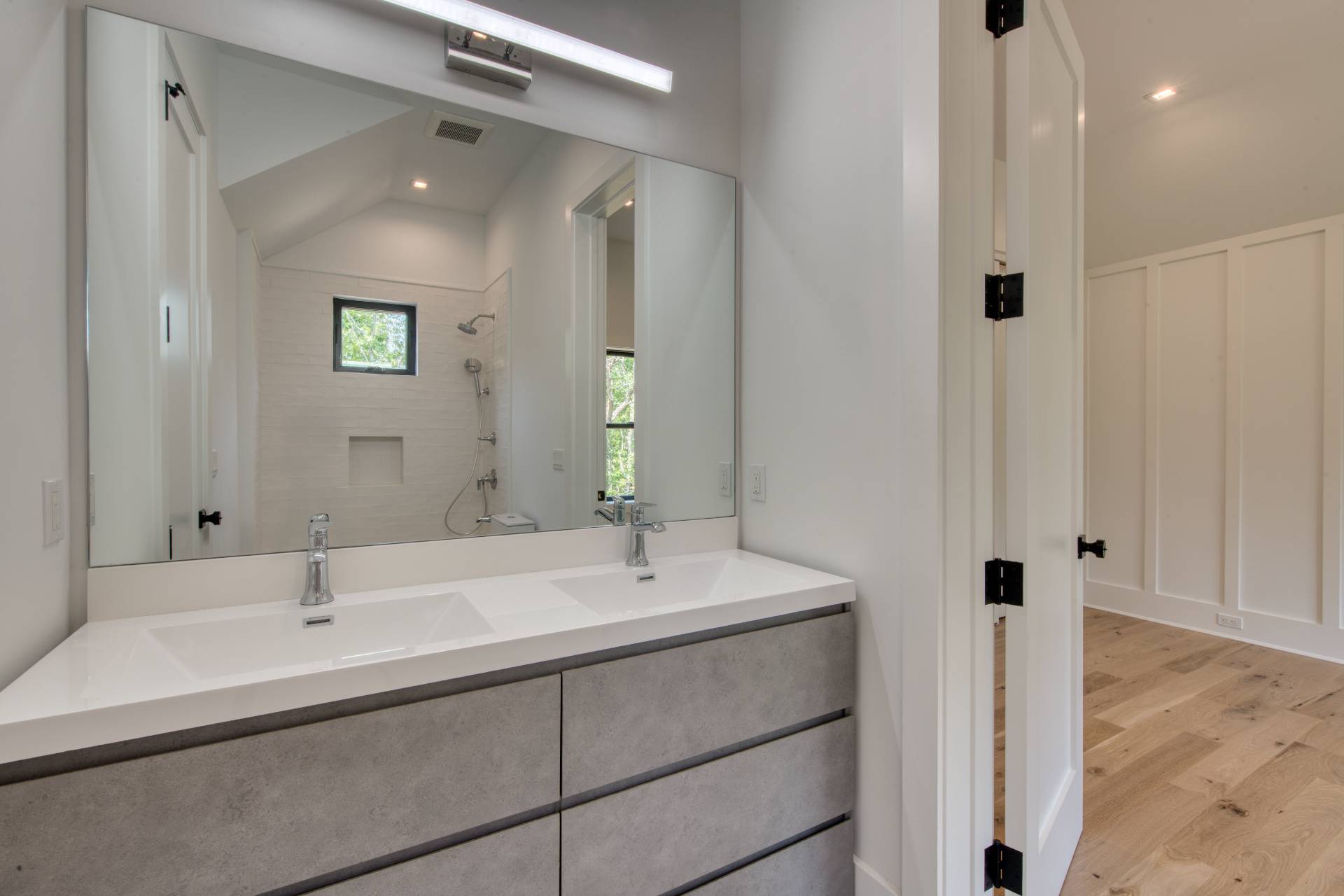 62 Whooping Hollow Road East Hampton, NY 11937 - Photo 18 of 29 a bathroom with a sink and a mirror