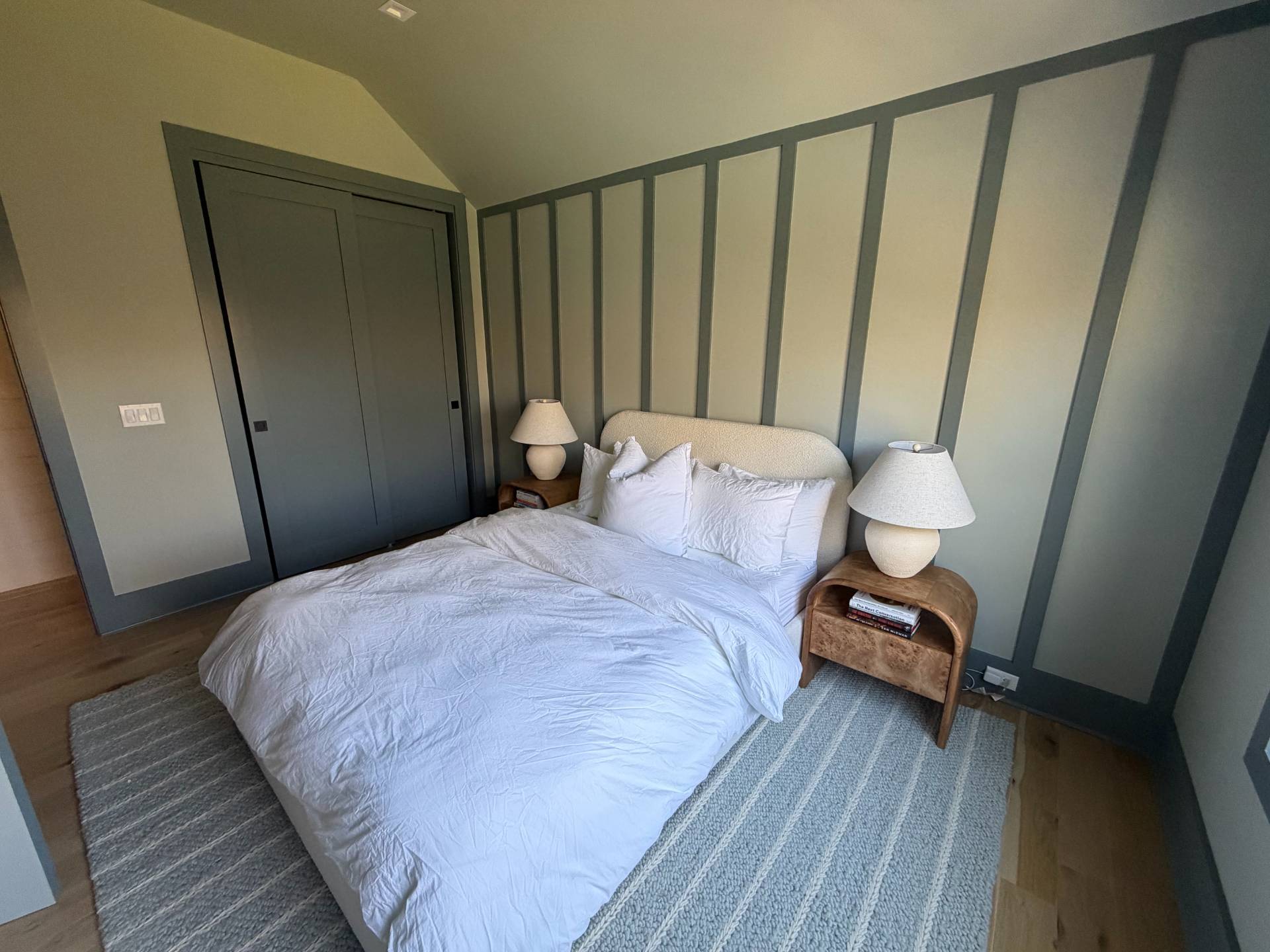 62 Whooping Hollow Road East Hampton, NY 11937 - Photo 20 of 31 a bedroom with a bed and a window