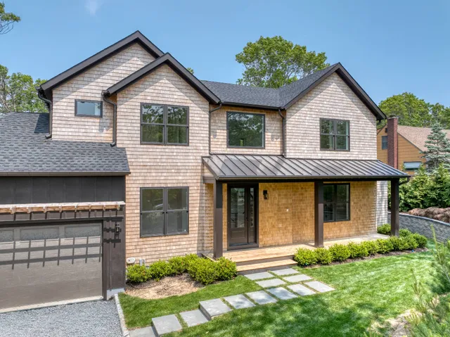 a kitchen with stainless steel appliances granite countertop a sink and a stove