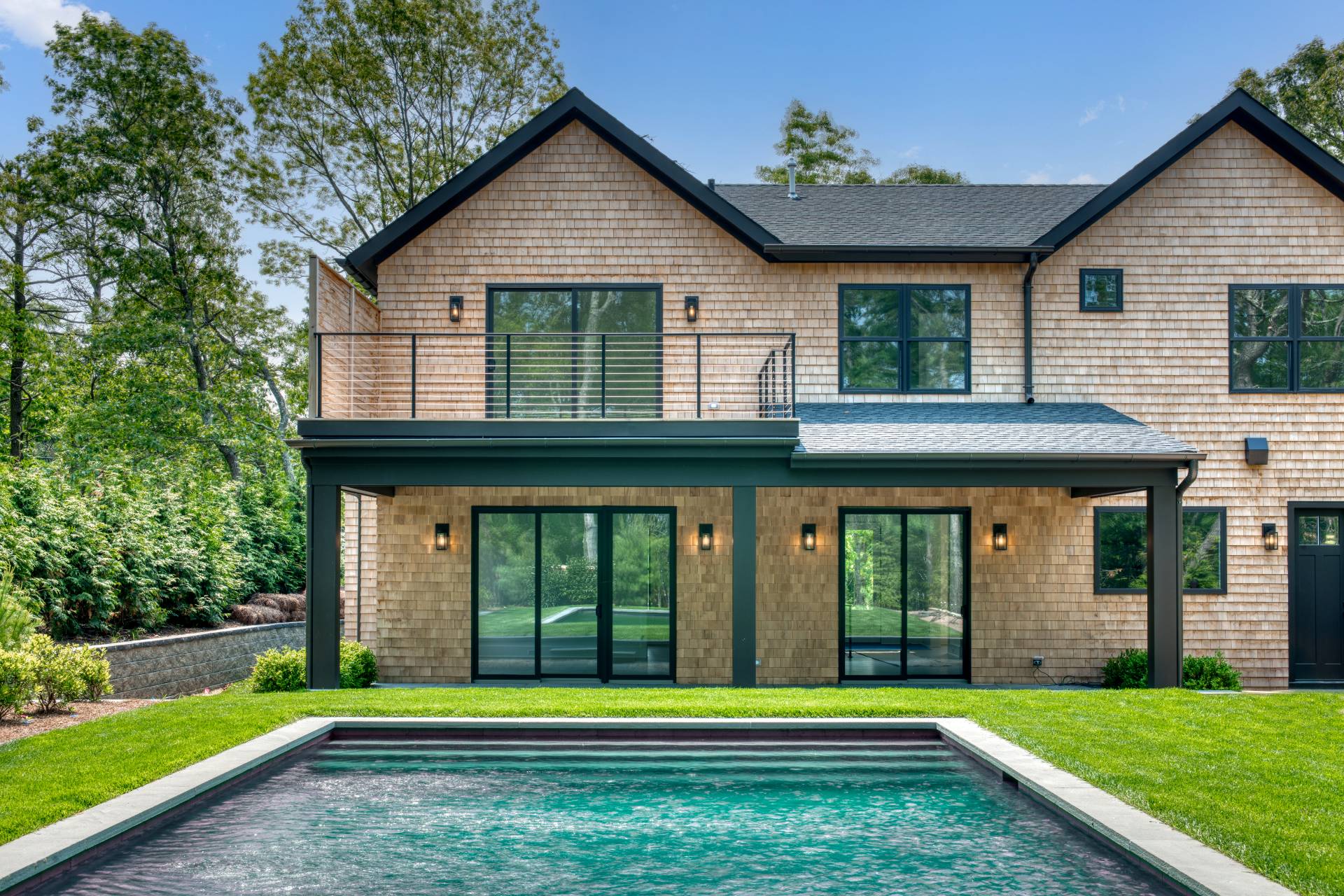 62 Whooping Hollow Road East Hampton, NY 11937 - Photo 24 of 29 a view of a house with a yard and porch
