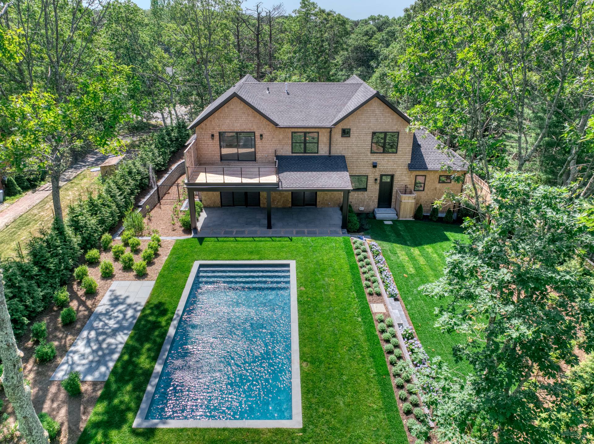 62 Whooping Hollow Road East Hampton, NY 11937 - Photo 28 of 29 a aerial view of a house with garden