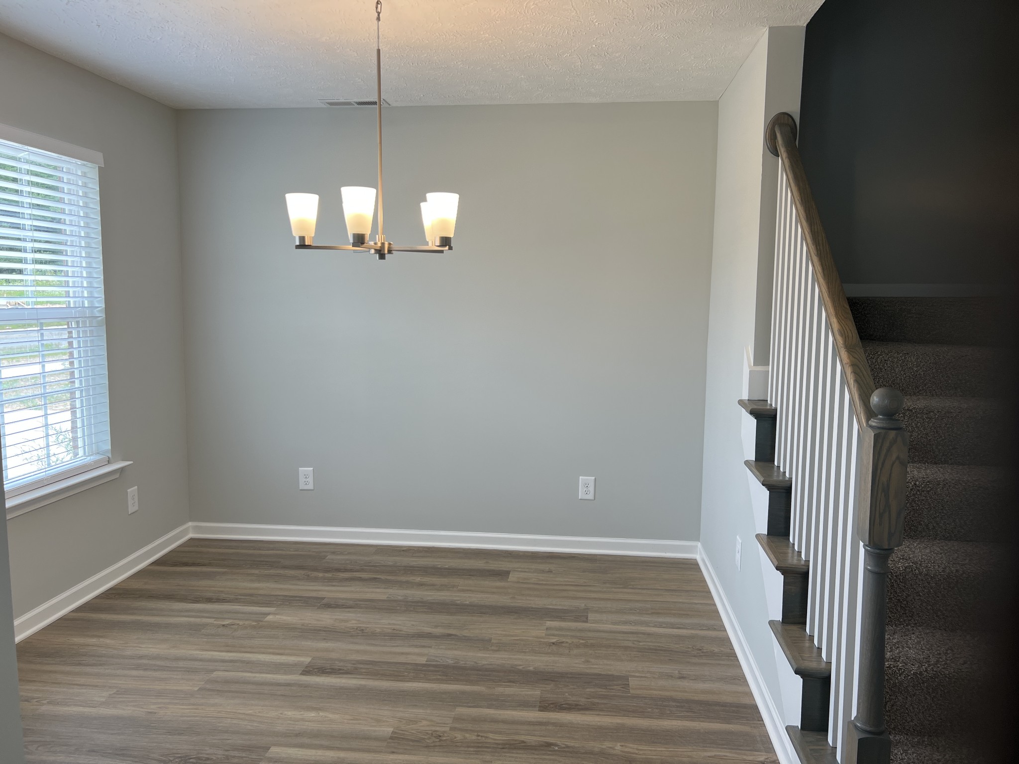 92 Timber Circle Manchester, TN 37355 - Photo 15 of 21 wooden floor in an empty room with a window