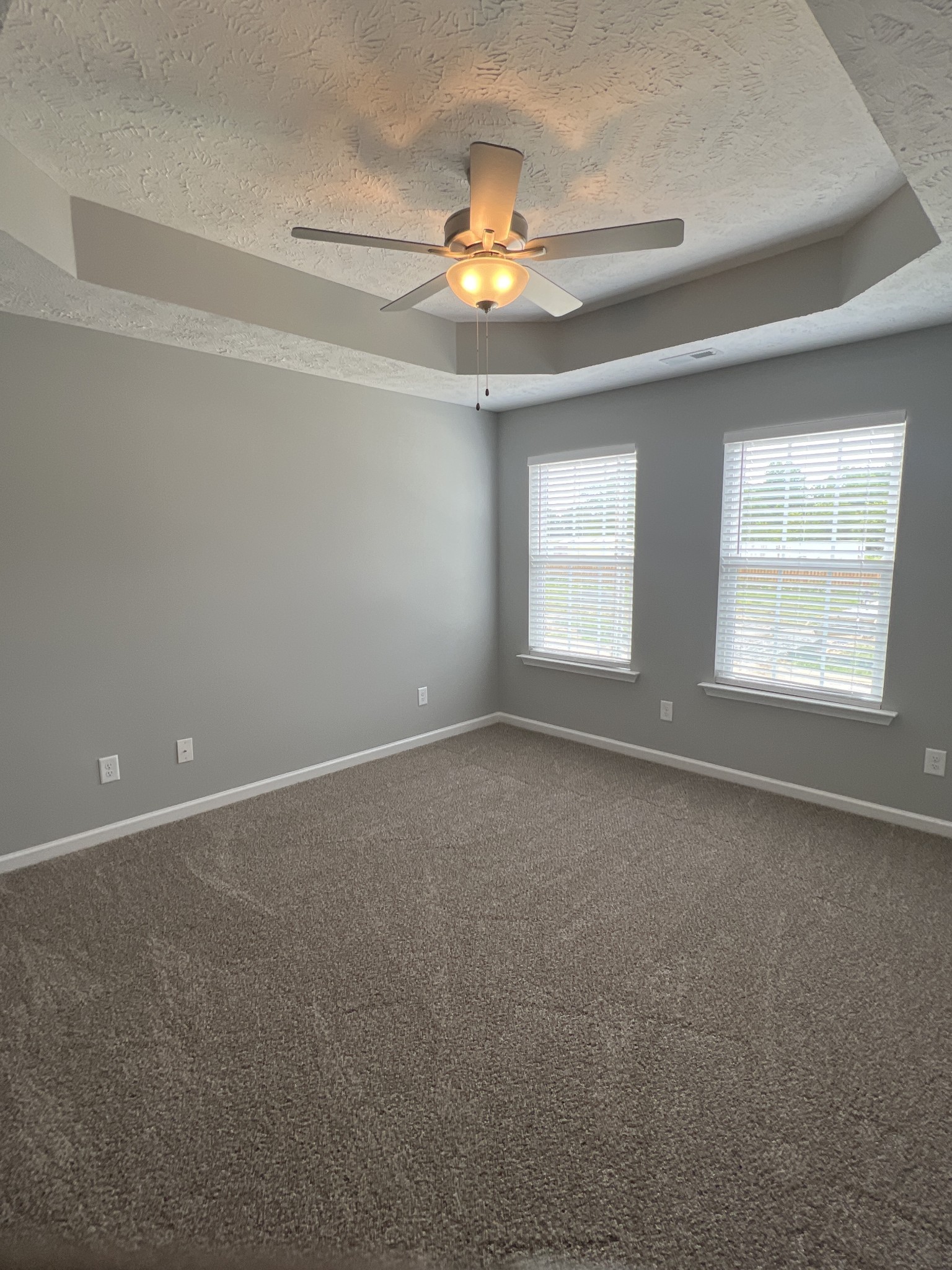 92 Timber Circle Manchester, TN 37355 - Photo 16 of 21 an empty room with windows and chandelier fan