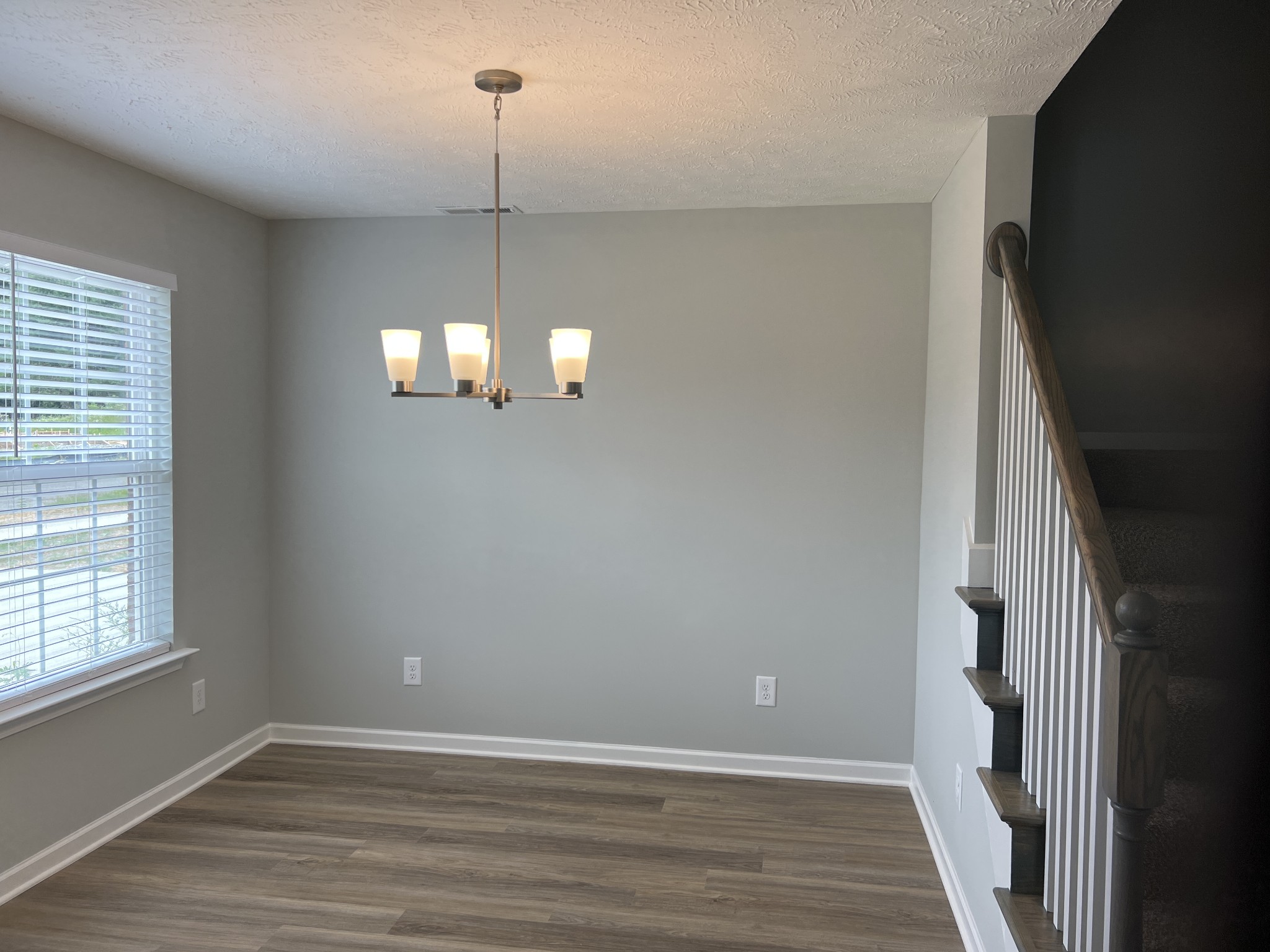 92 Timber Circle Manchester, TN 37355 - Photo 21 of 21 an empty room with wooden floor and windows