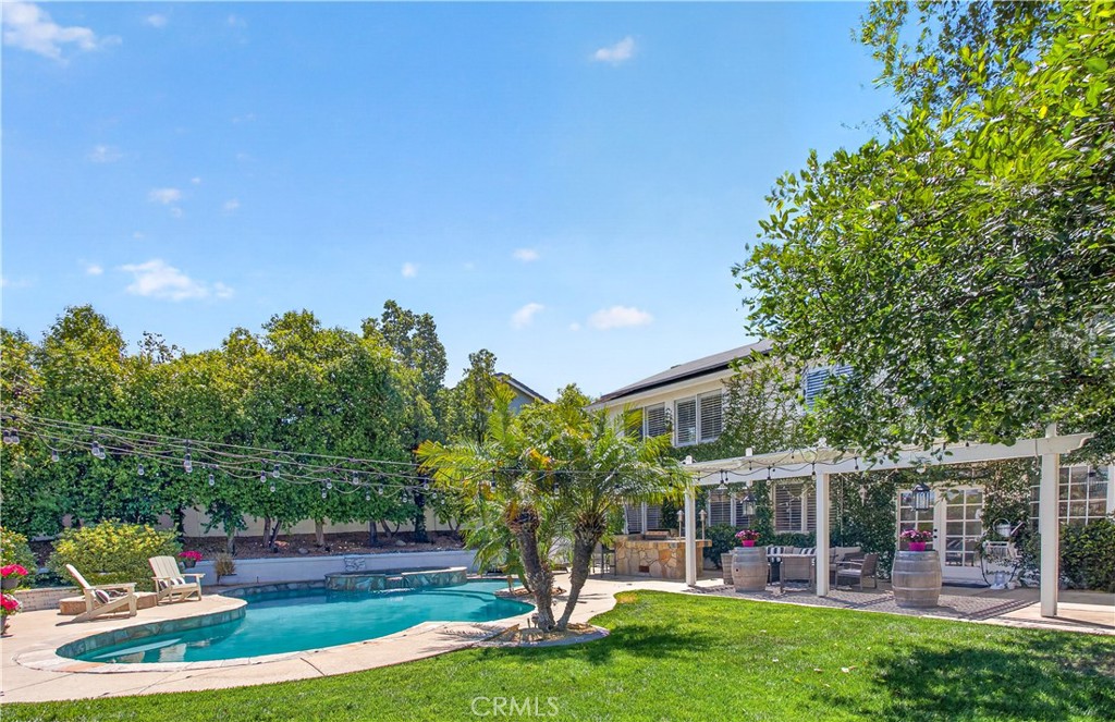 31928 Cercle Chambertin Temecula, CA 92591 - Photo 53 of 74 a view of a house with backyard and porch