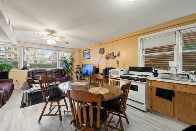 a view of a dining room with furniture window and outside view