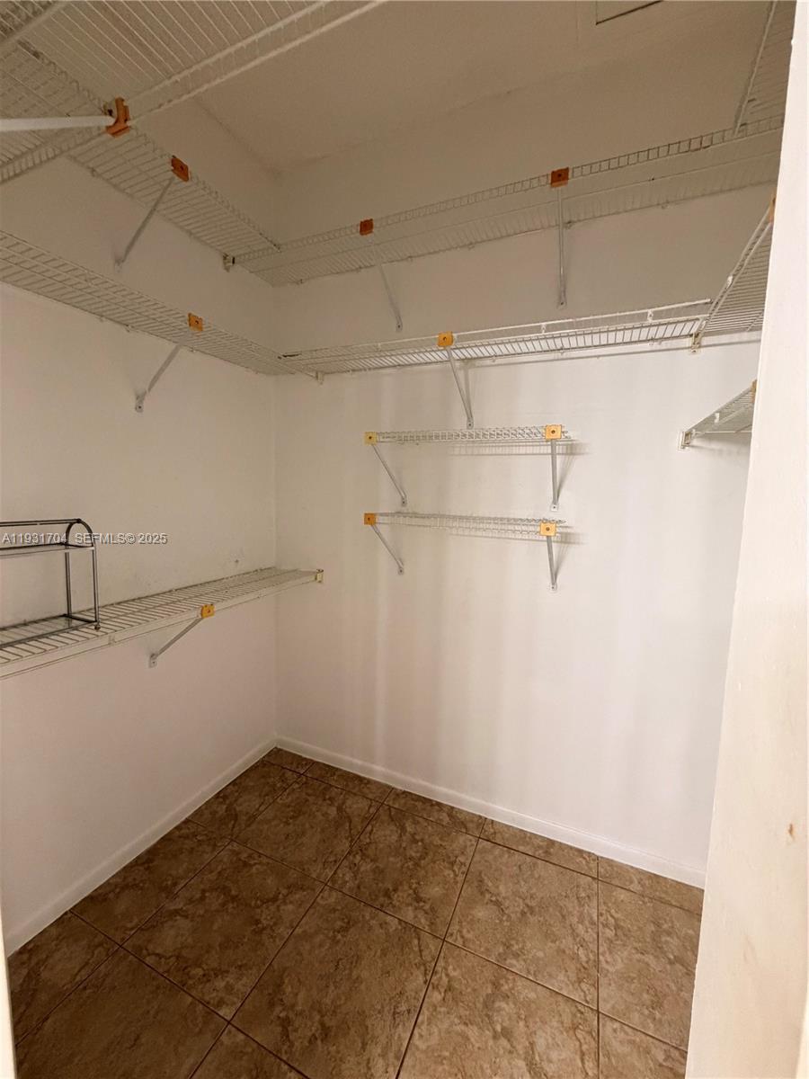 Boca Pointe Boca Raton, FL 33433 - Photo 16 of 32 a view of a room with racks on the wall