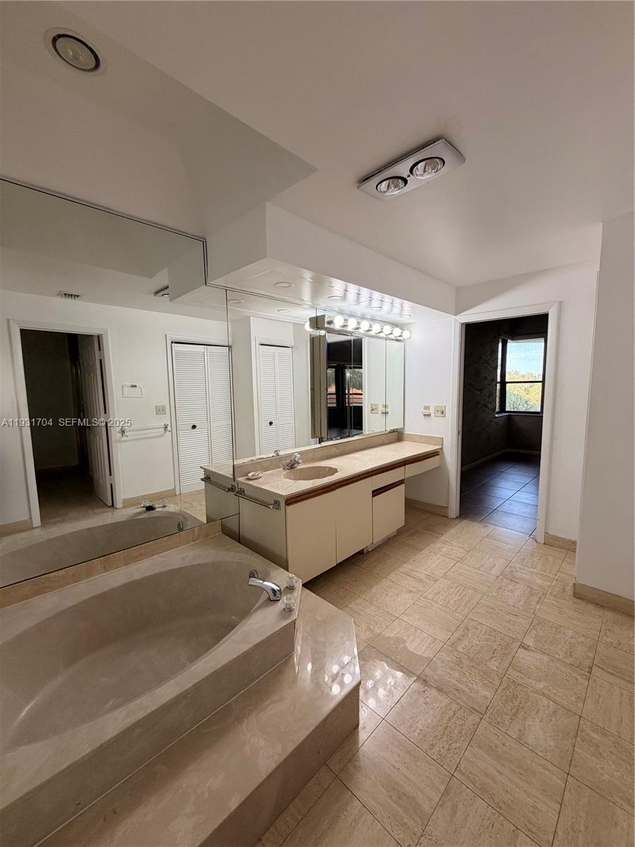 Boca Pointe Boca Raton, FL 33433 - Photo 17 of 32 a lobby with furniture and flat screen tv