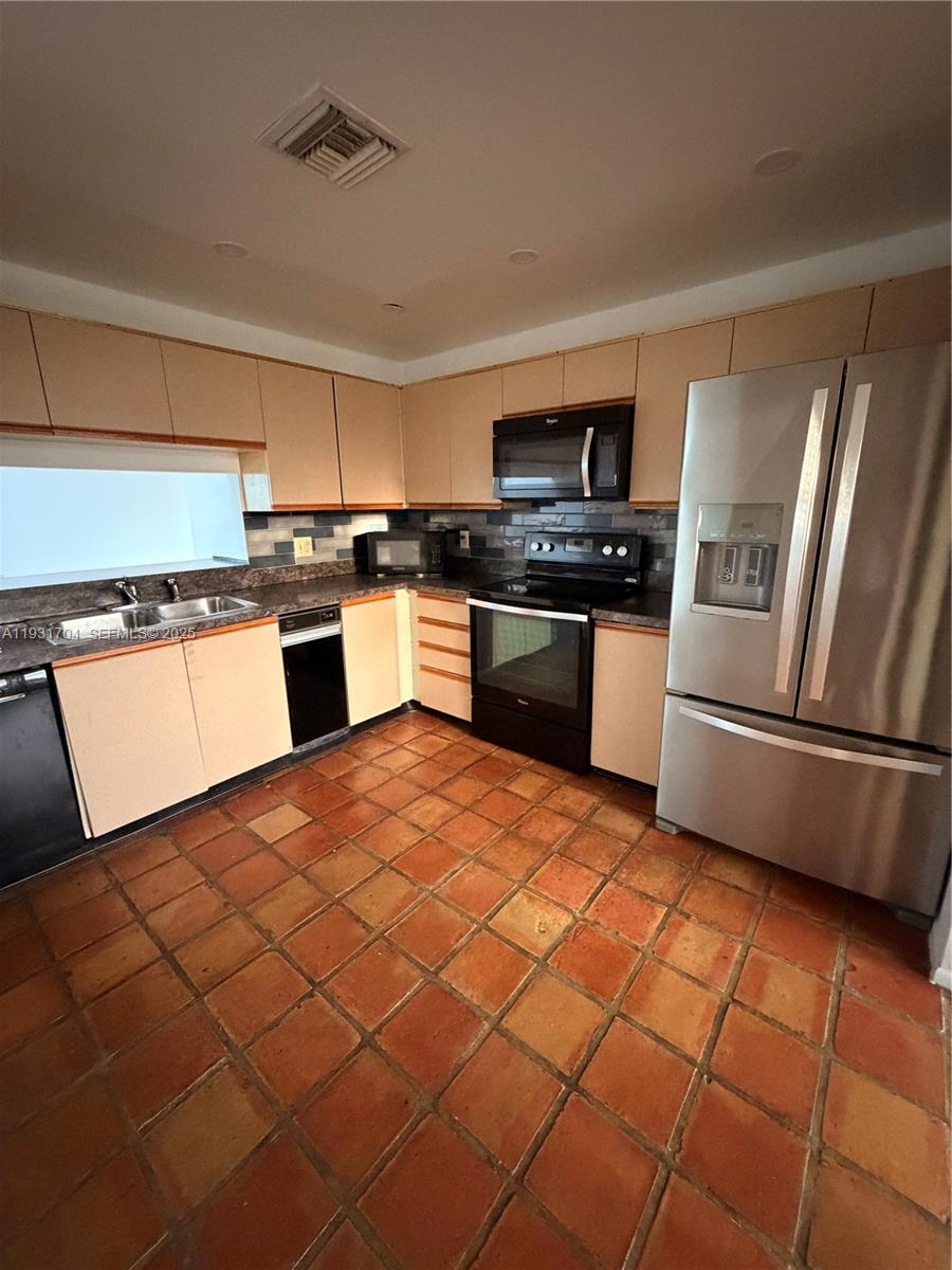 Boca Pointe Boca Raton, FL 33433 - Photo 30 of 32 a kitchen with stainless steel appliances granite countertop a sink and a stove
