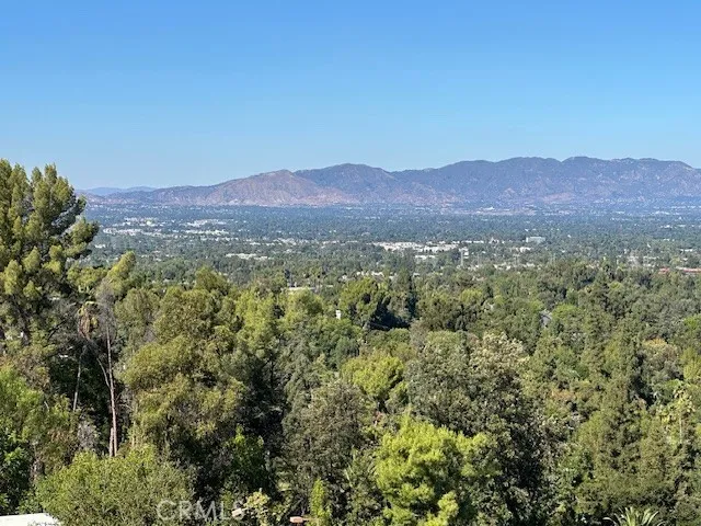 a view of a city with mountain
