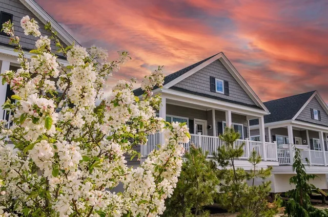 front view of a house with a small yard