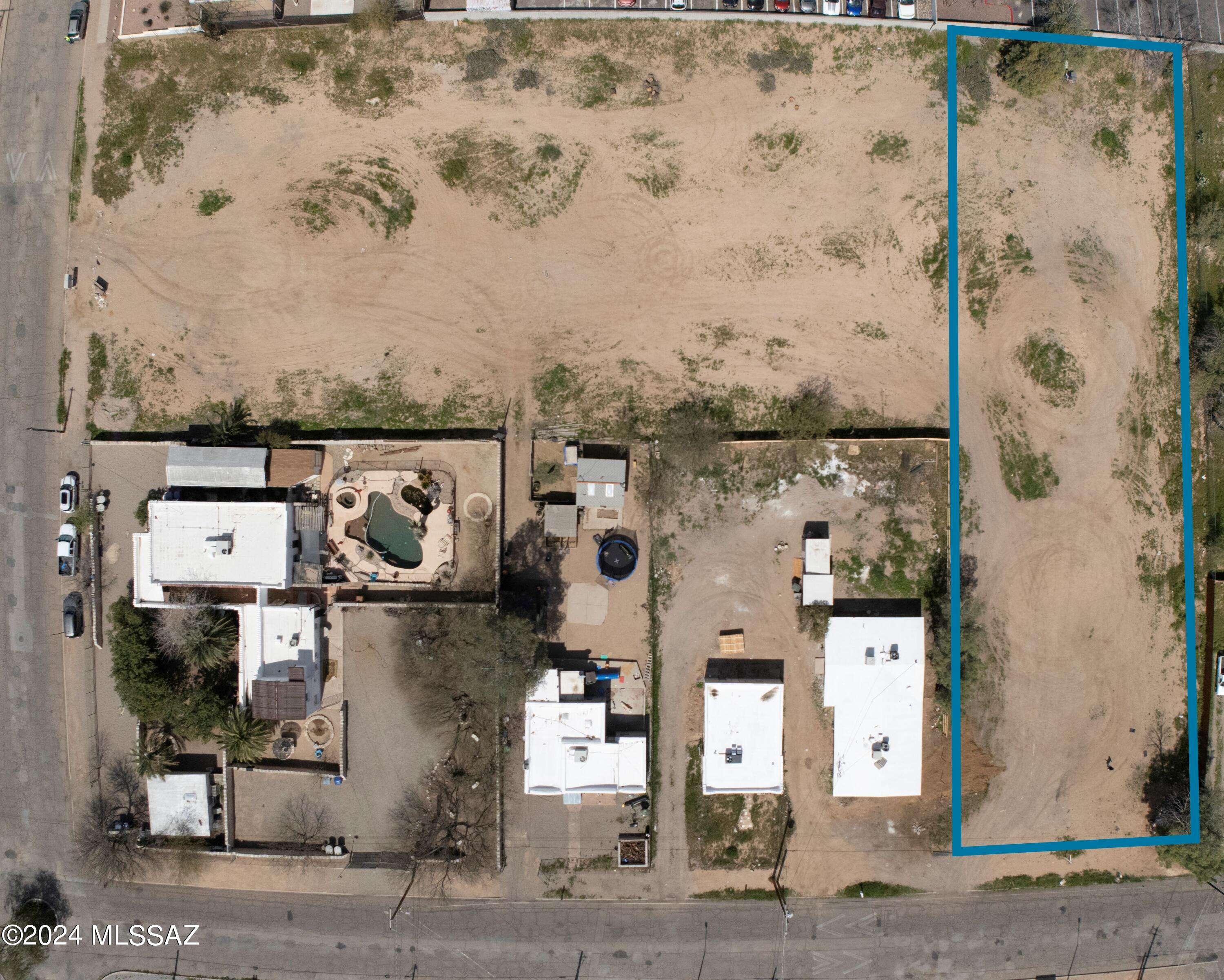 423 East Yavapai Road, Unit 101 Tucson, AZ 85705 - Photo 4 of 4 an aerial view of residential houses with outdoor space