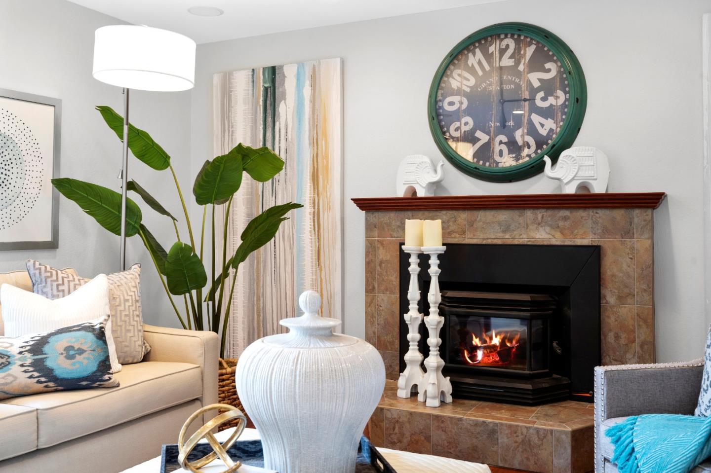 155 Belhaven Drive Los Gatos, CA 95032 - Photo 15 of 30 a living room with furniture a chandelier and a fireplace