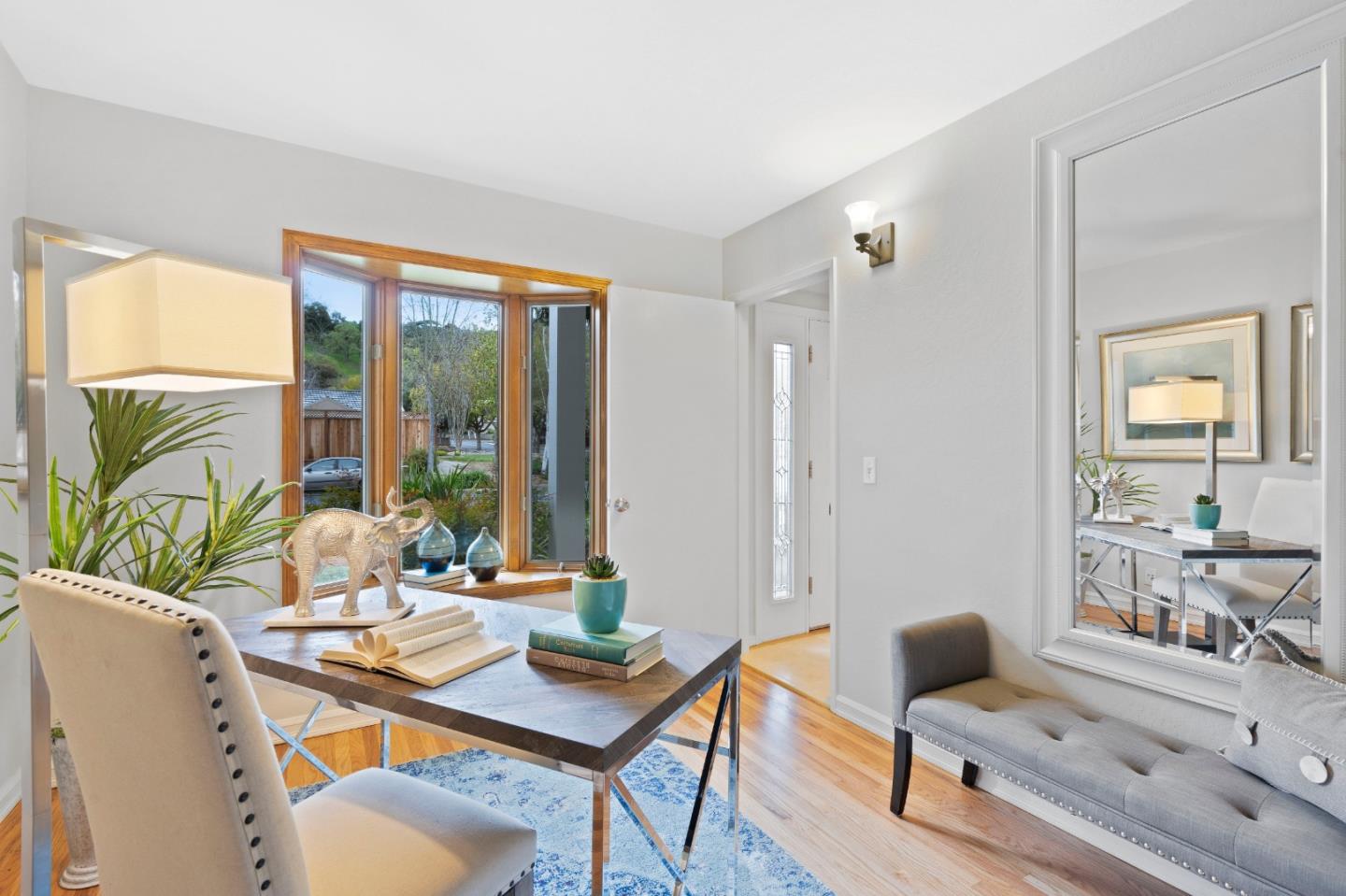 155 Belhaven Drive Los Gatos, CA 95032 - Photo 17 of 30 a living room with furniture and a large window