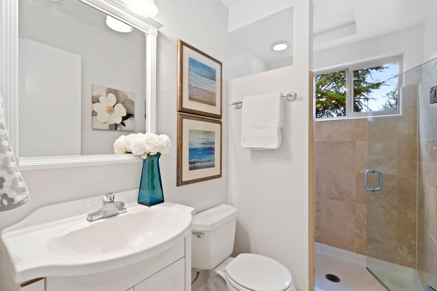 155 Belhaven Drive Los Gatos, CA 95032 - Photo 18 of 30 a bathroom with a sink toilet and shower