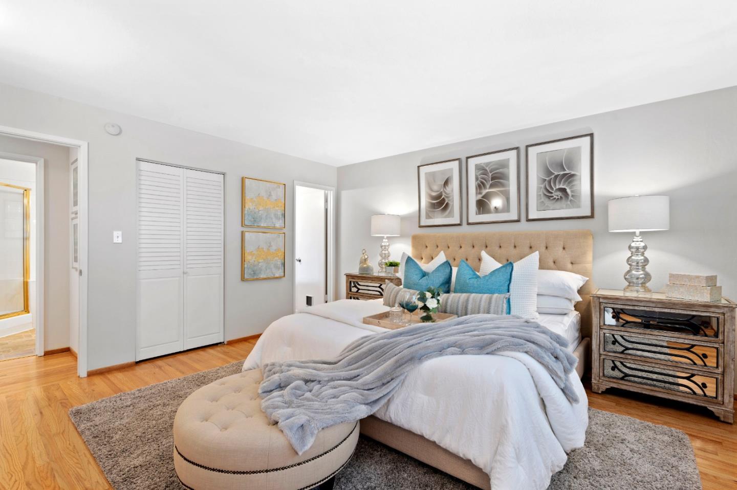 155 Belhaven Drive Los Gatos, CA 95032 - Photo 20 of 30 a bedroom with a bed and wooden floor